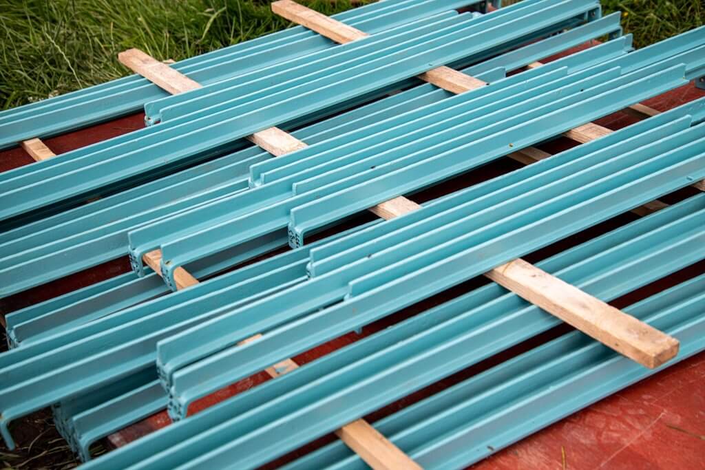 The repainted ironwork ready to reinstated inside the glasshouses. Part of the glasshouses restoration gallery.