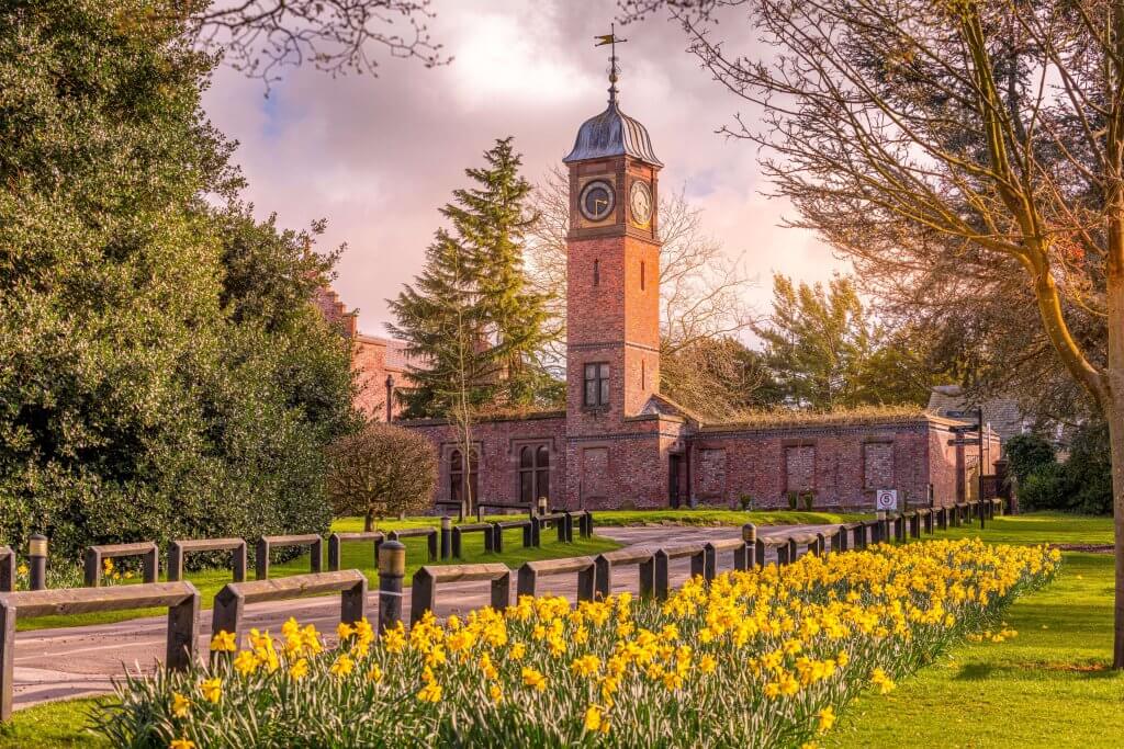 Walton Hall and Gardens in springtime with daffodils