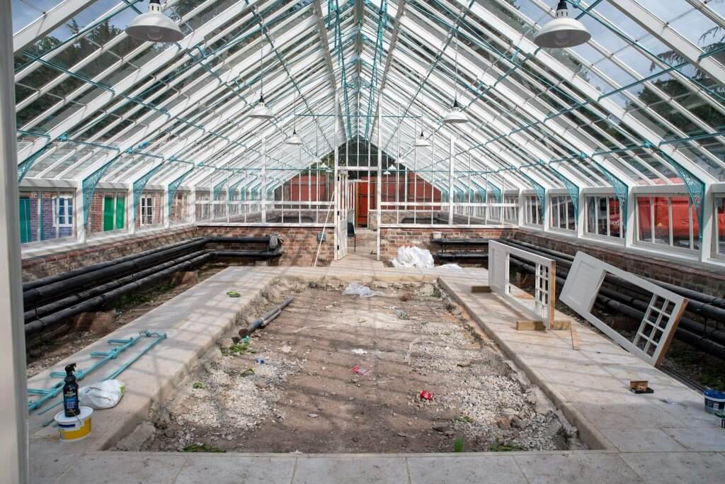 The glasshouses before they have their glass panels in place. Picture part of the glasshouses restoration gallery