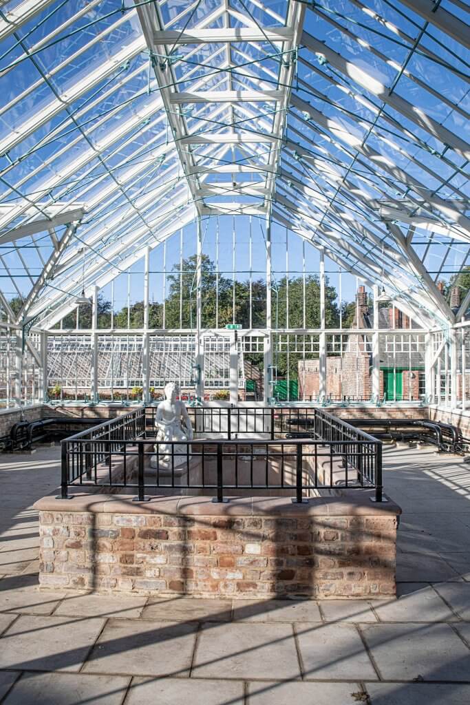 The newly restored glasshouses in the autumn sunshine