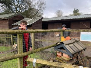 Myerscough student posing inside the Children's Zoo, learning about the heritage of Walton Hall and Gardens estate