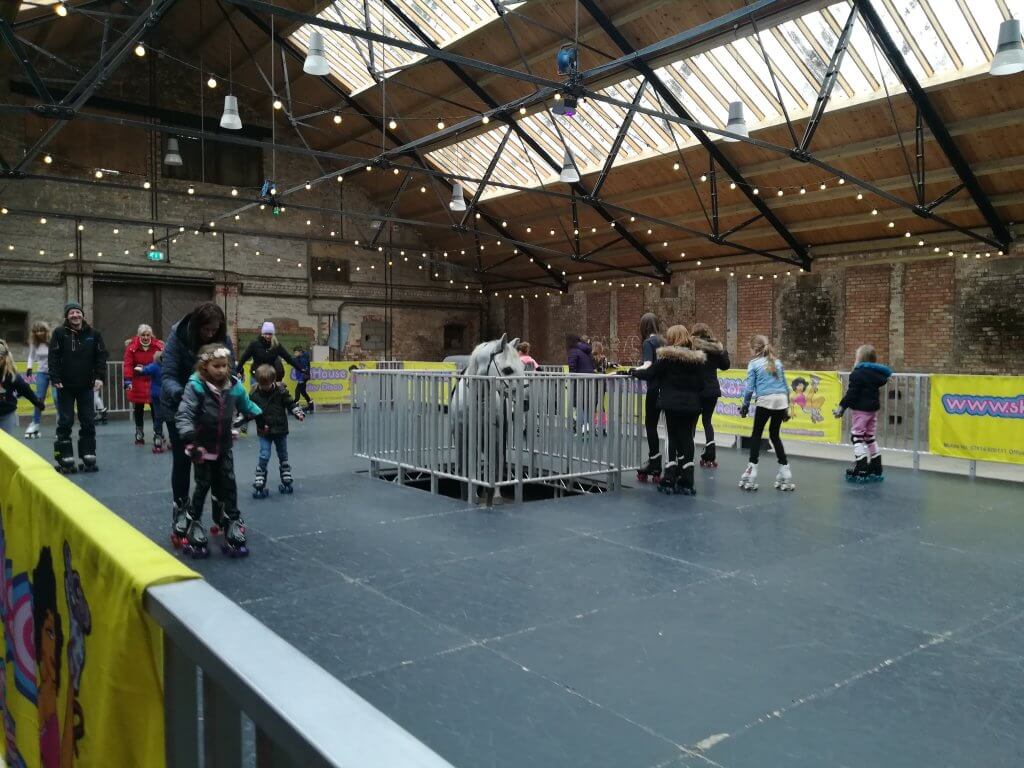 Roller skating inside the Stables