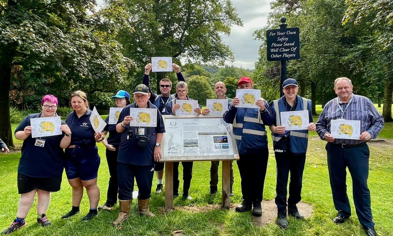 Learners from Walton Lea Partnership join staff from Walton Hall and Gardens at the starting point of the new orienteering courses.