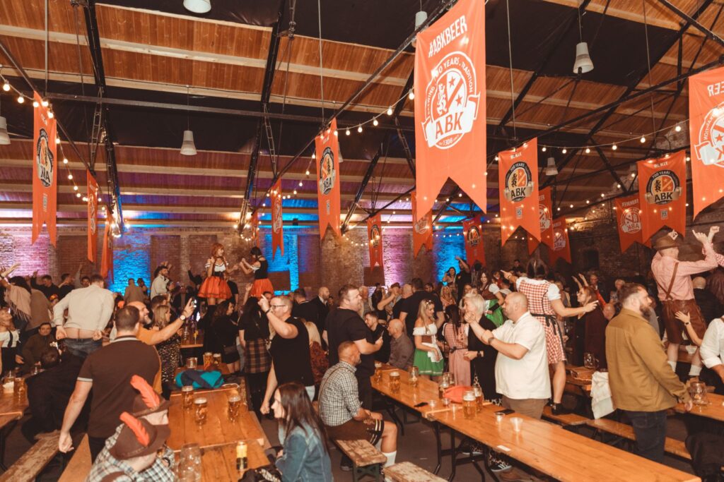 An Oktoberfest event takes place inside the Old Riding School.
