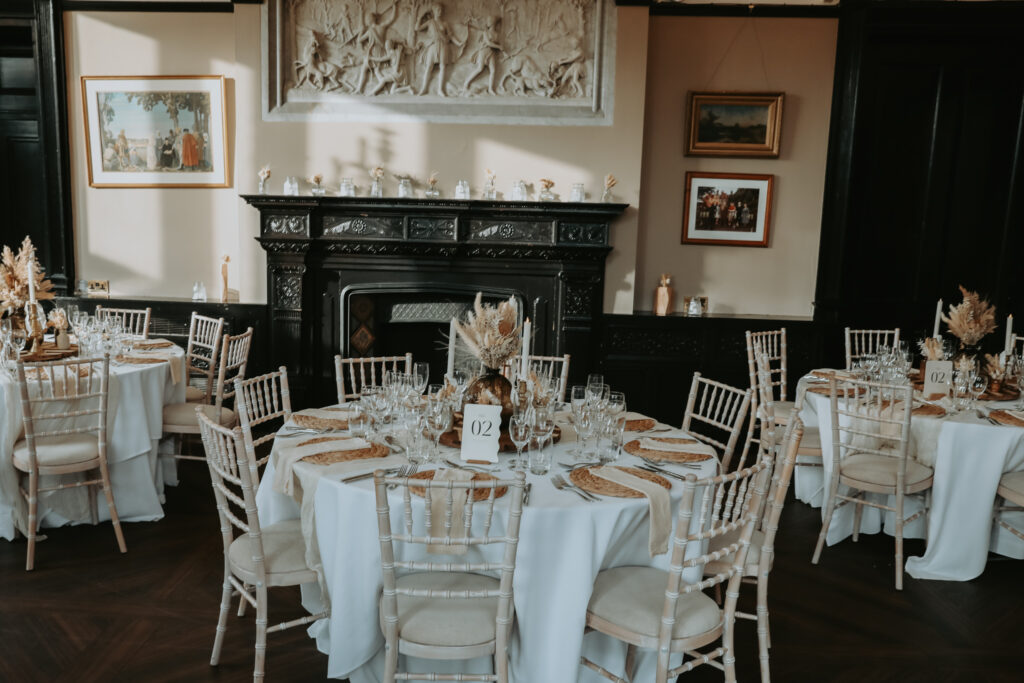 A dinner party set-up within Walton Hall